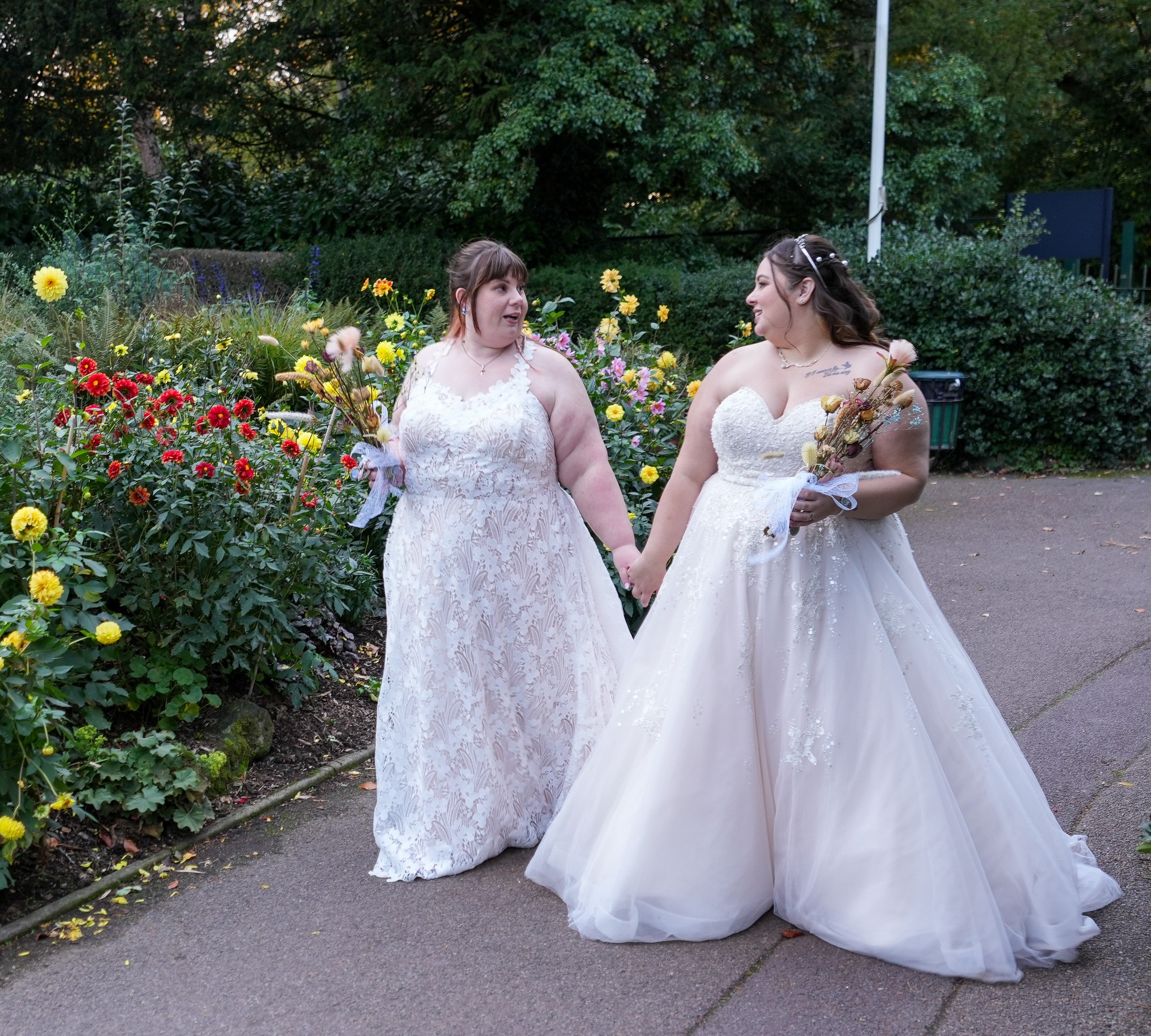 Nathalie and Sarah walking together on their wedding day